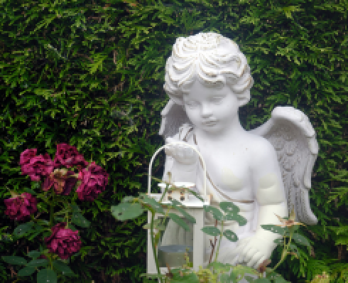 Statue of an angel in a garden