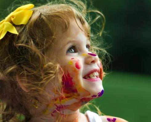 Young girl with paint on her face