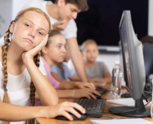 Student thinking in front of a computer screen