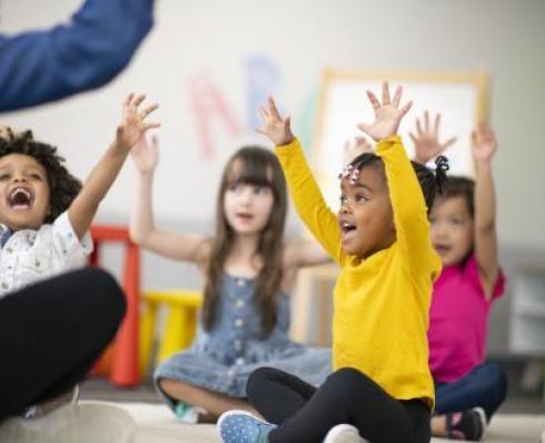 Children with hands up