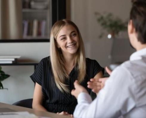 Two adults having a conversation