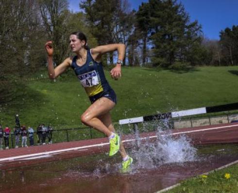 Athlete competing in the steeplechase 