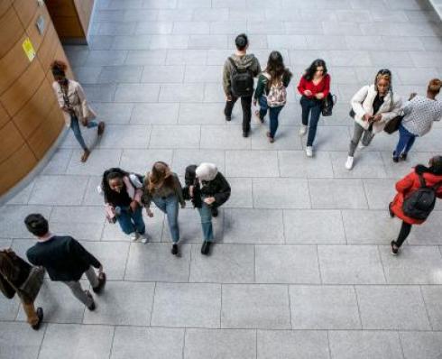 Students walking in Lonsdale Building