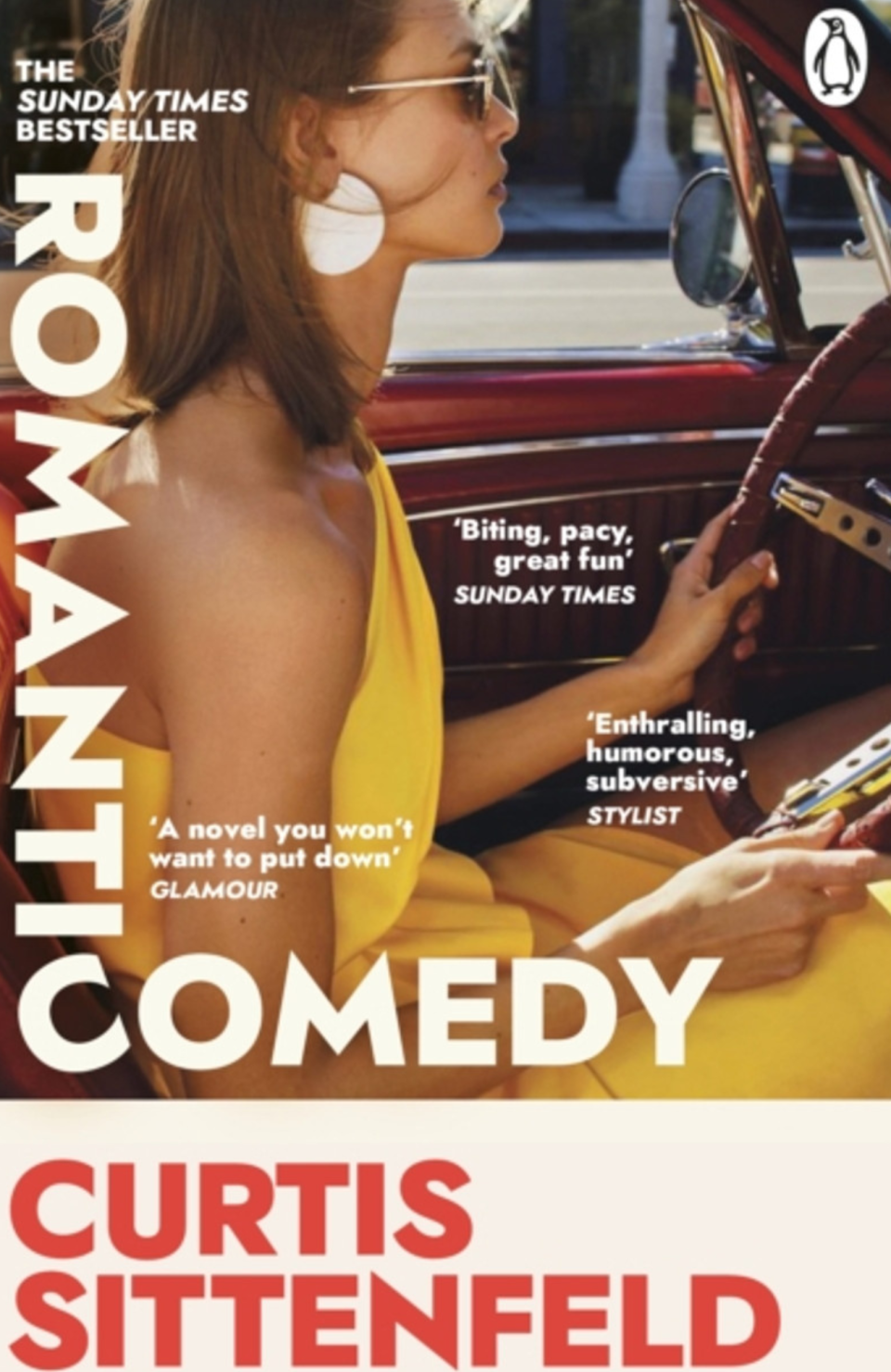 Cover of the book Romantic Comedy by Curtis Sittenfeld. Shows a woman driving a car.