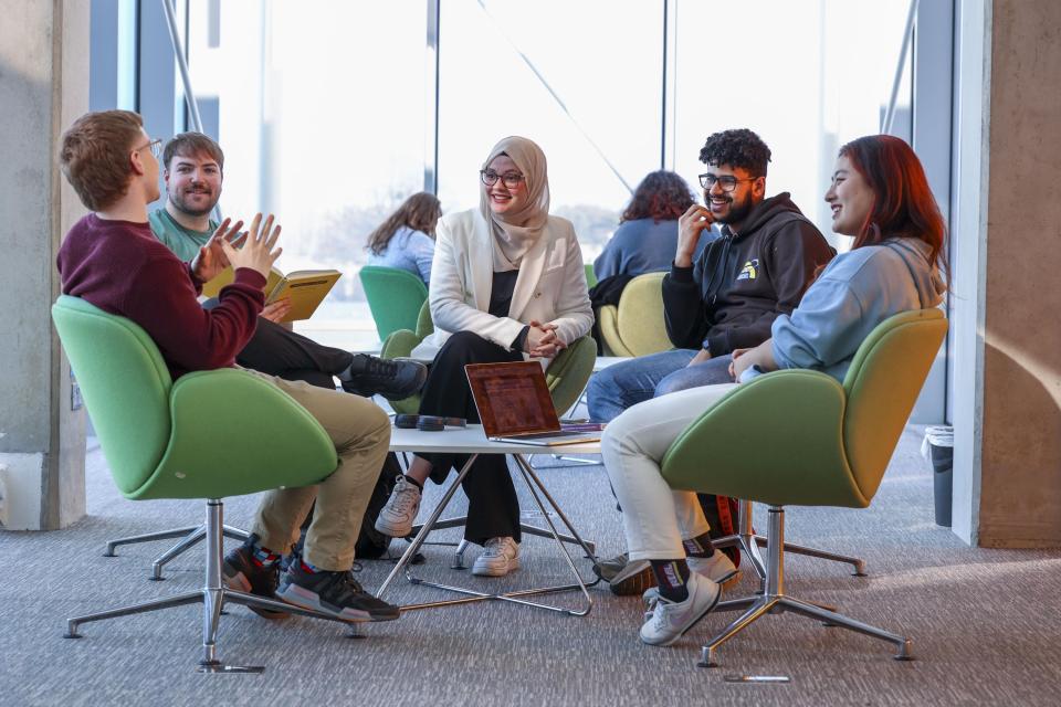 students studying in a group in Cregan Library