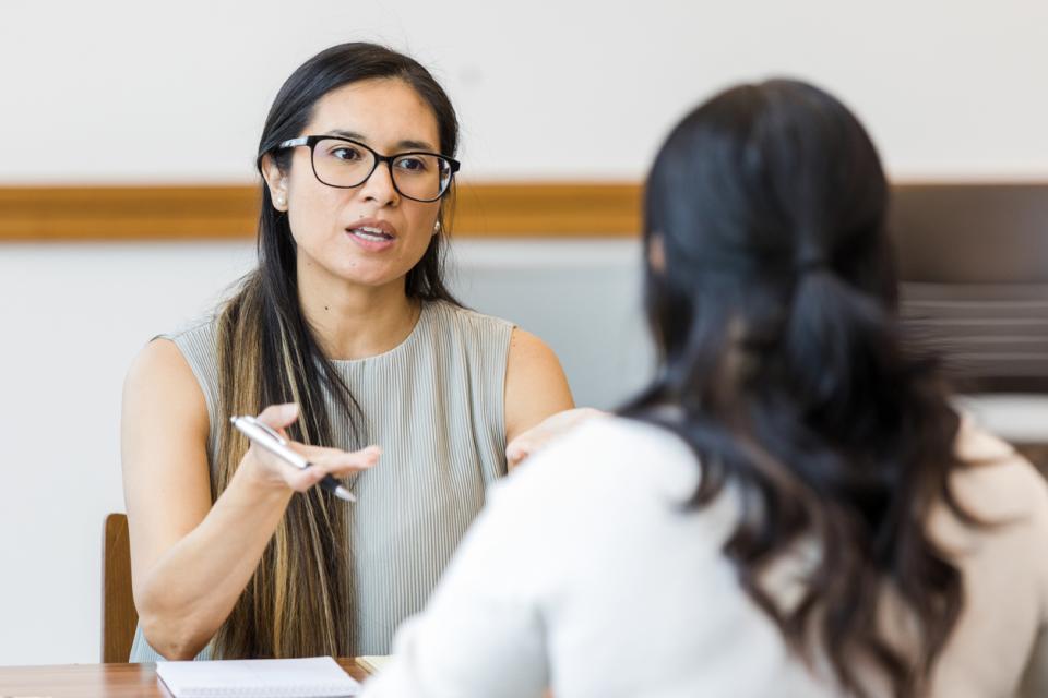 Two colleagues having a performance review