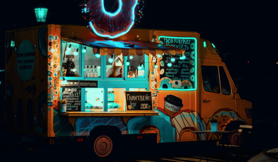 Food truck illuminated by blue fluorescent lights 