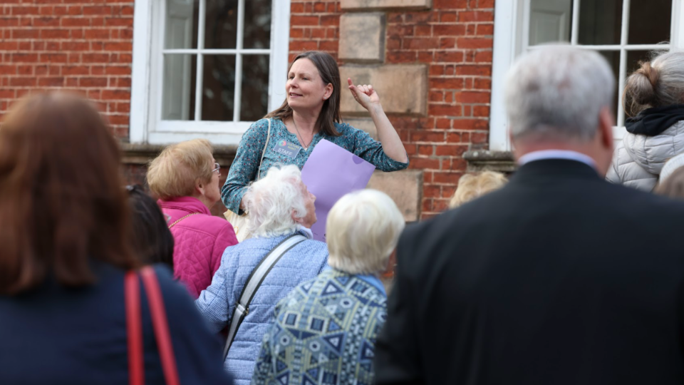 Dr Ruth McManus speaks to an audience outside Belvedere House