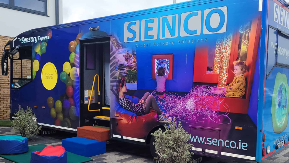 Colourful Bus with plants and beans bags