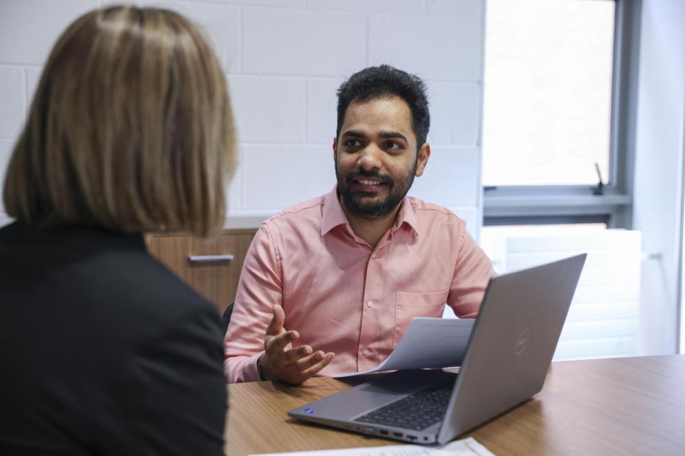 Two colleagues in a meeting