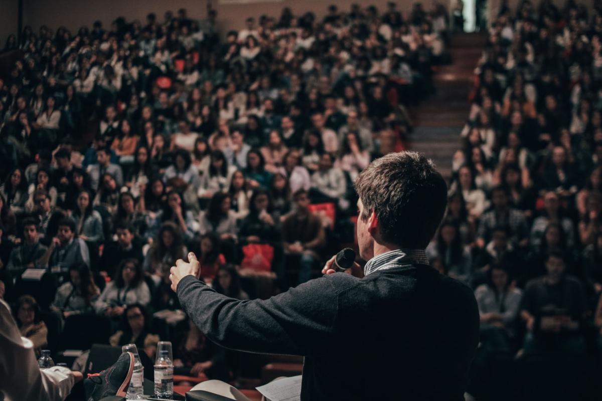 Lecturer in a large theatre