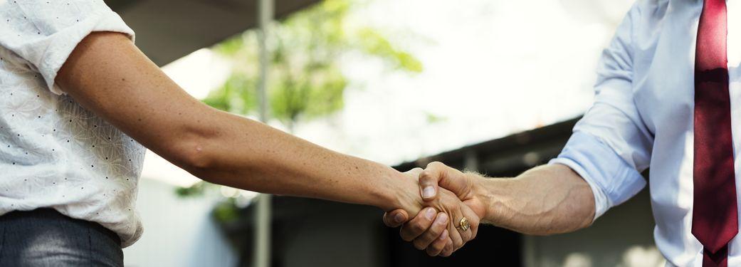 Two people shaking hands