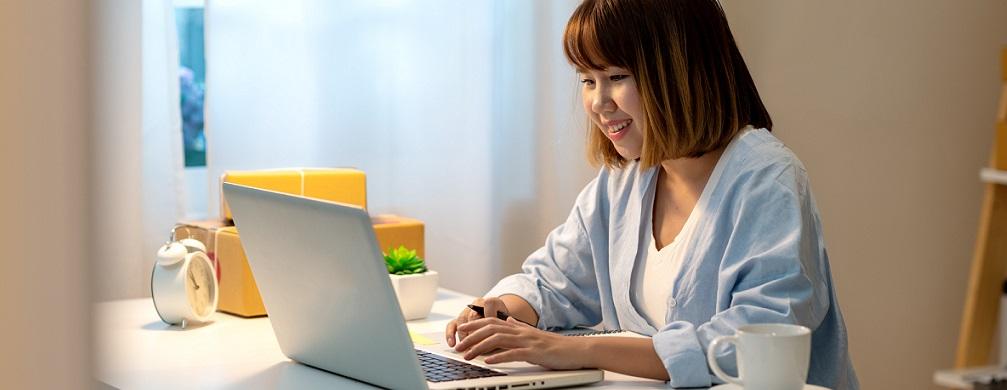 Woman sitting at computer