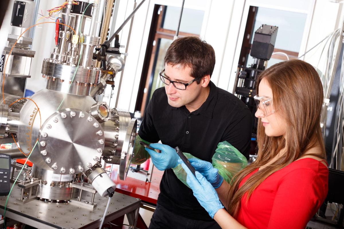 a male and female in a lab