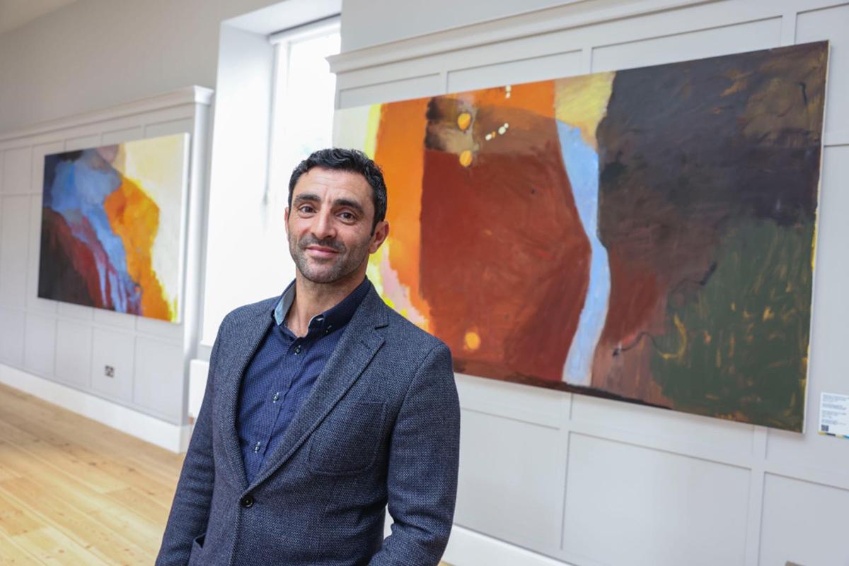 Artist Richard Hearns with his artwork Nexus, unveiled at an event today in Dublin City University's Albert College, the university's oldest building.