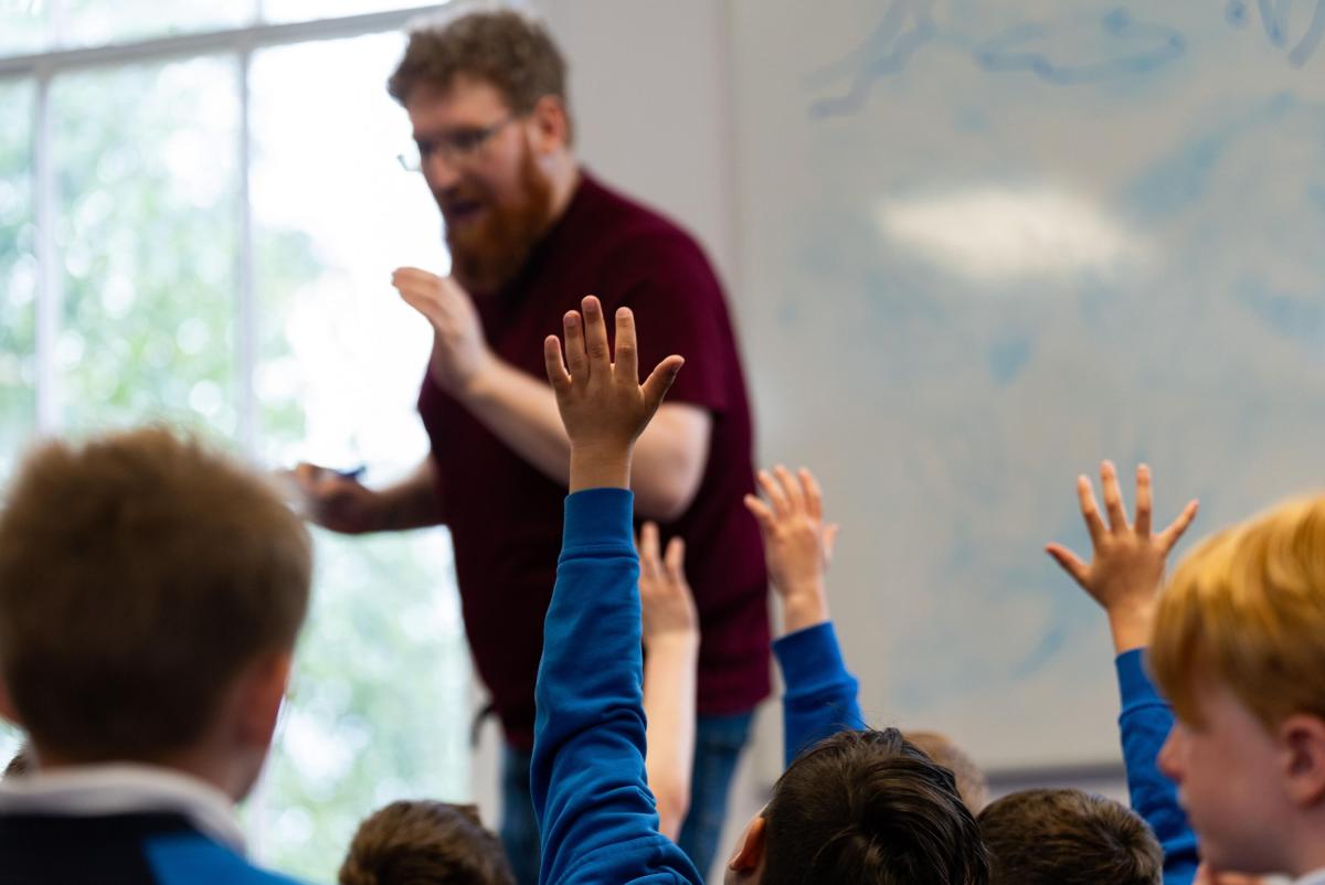 Shows DCU writer in residence Dave Rudden engaging children in socio-dramatic play