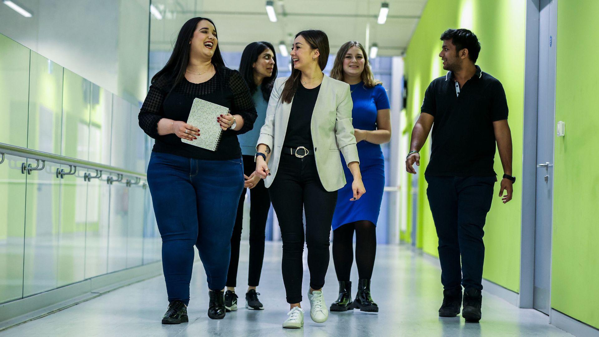 students walking in corridor