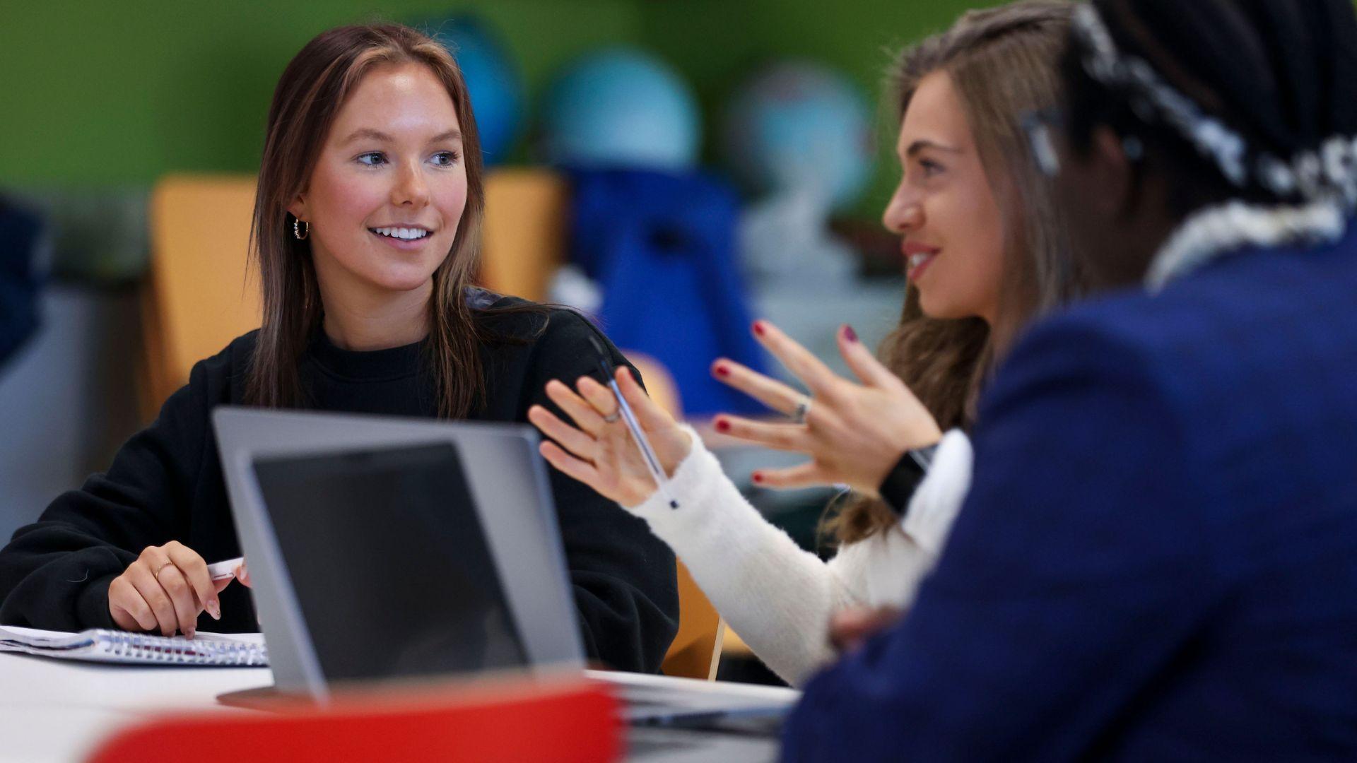 students at laptops