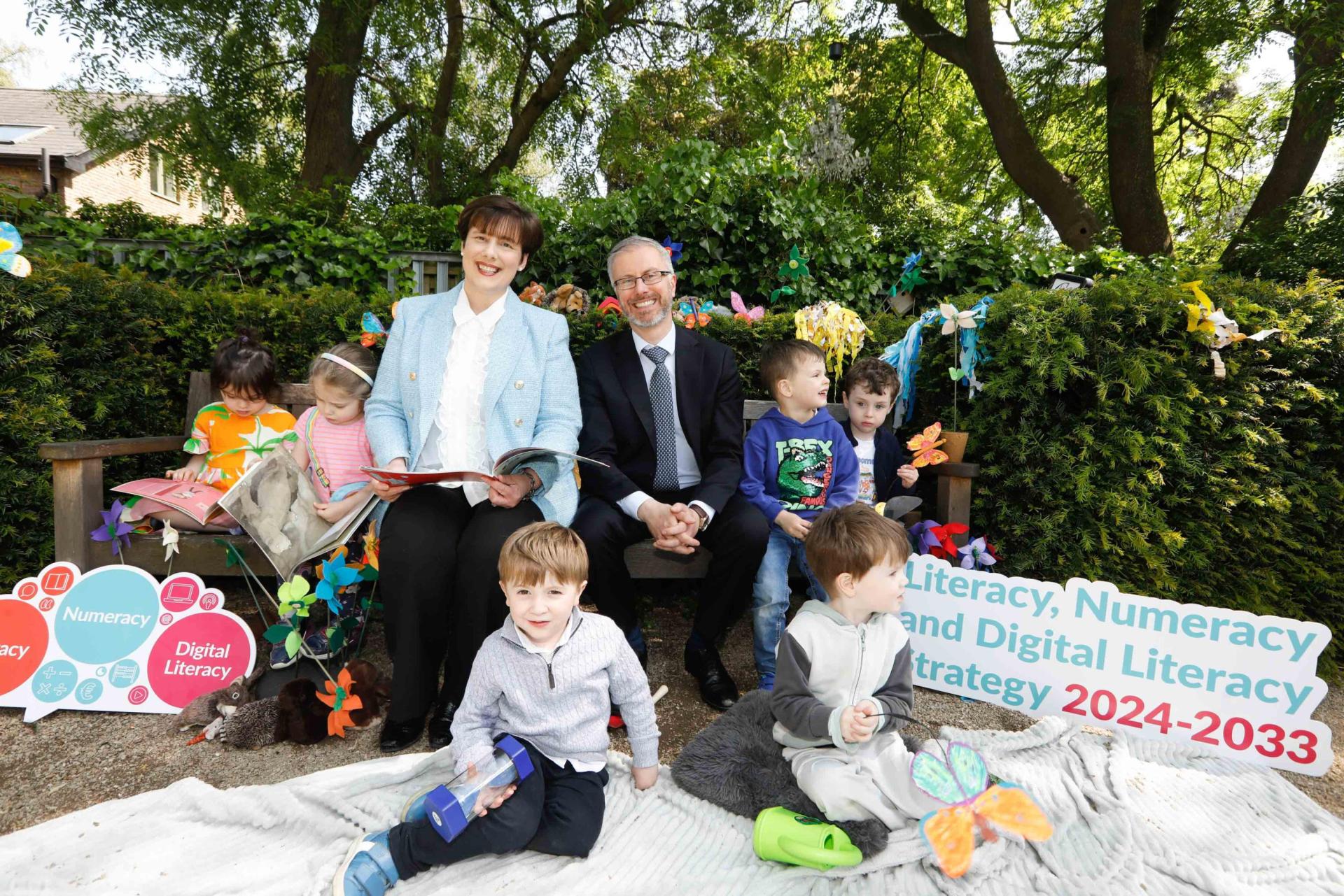 Ministers Norma Foley and Roderic Gorman pictured at the launch with young children.