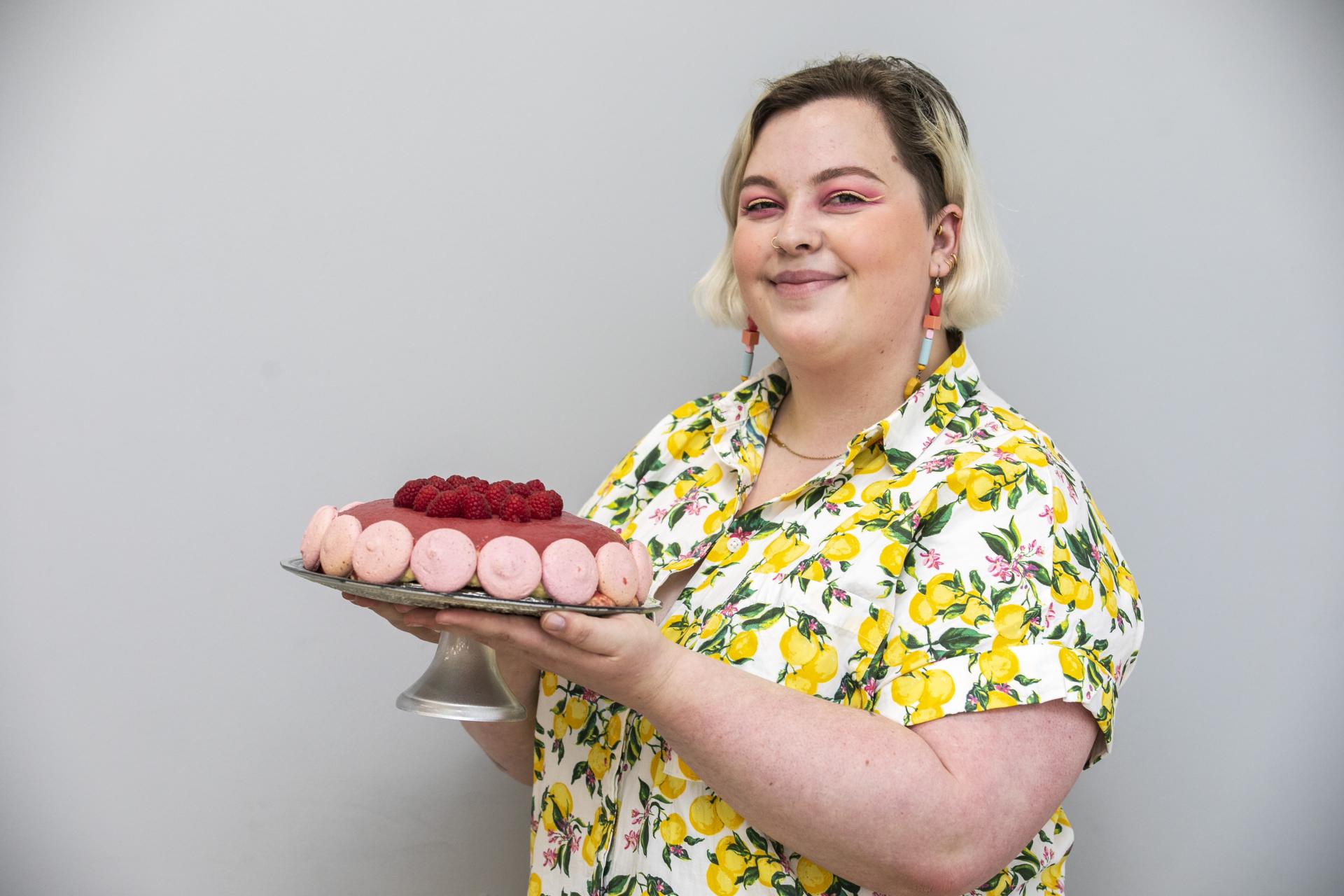 Shows Hazel with her Raspberry and Honey Summer Torte for DCU Bake Off For Barretstown