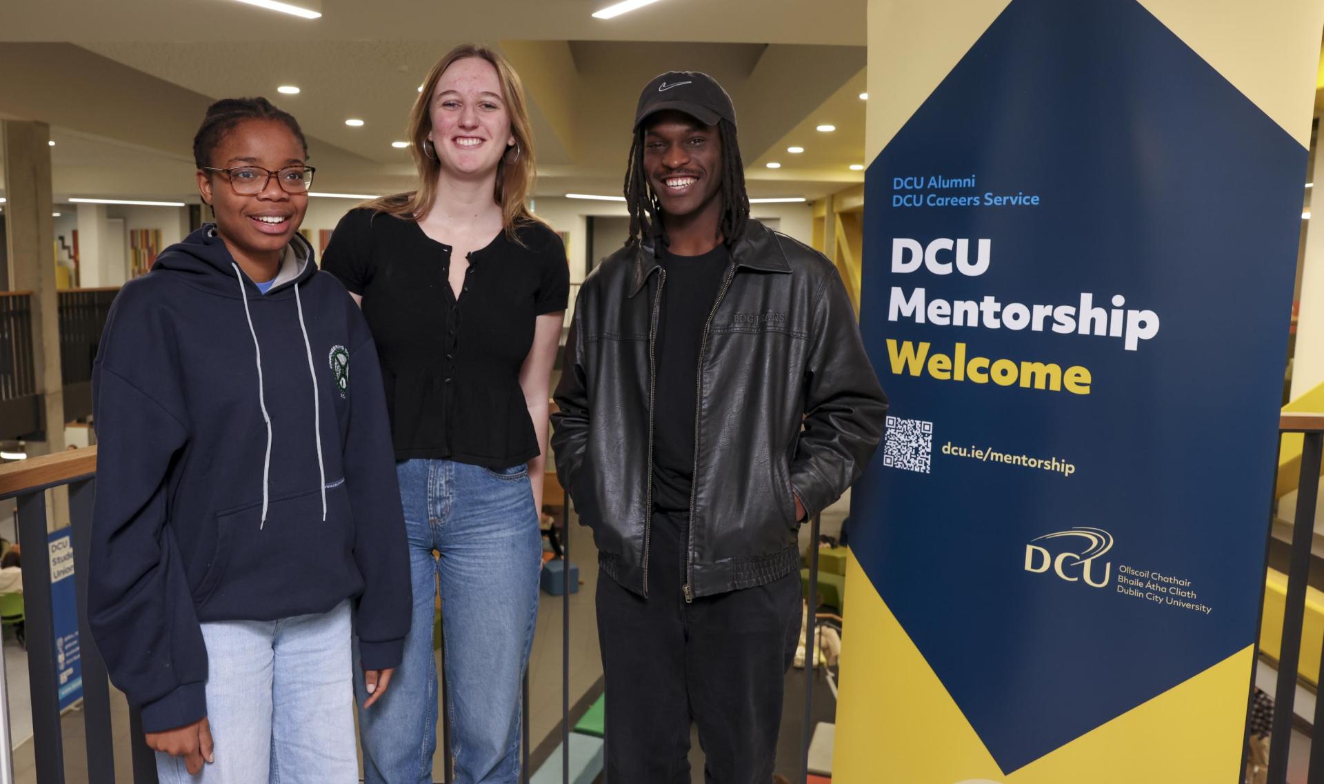 Three students at the DCU Mentorship Welcome event.