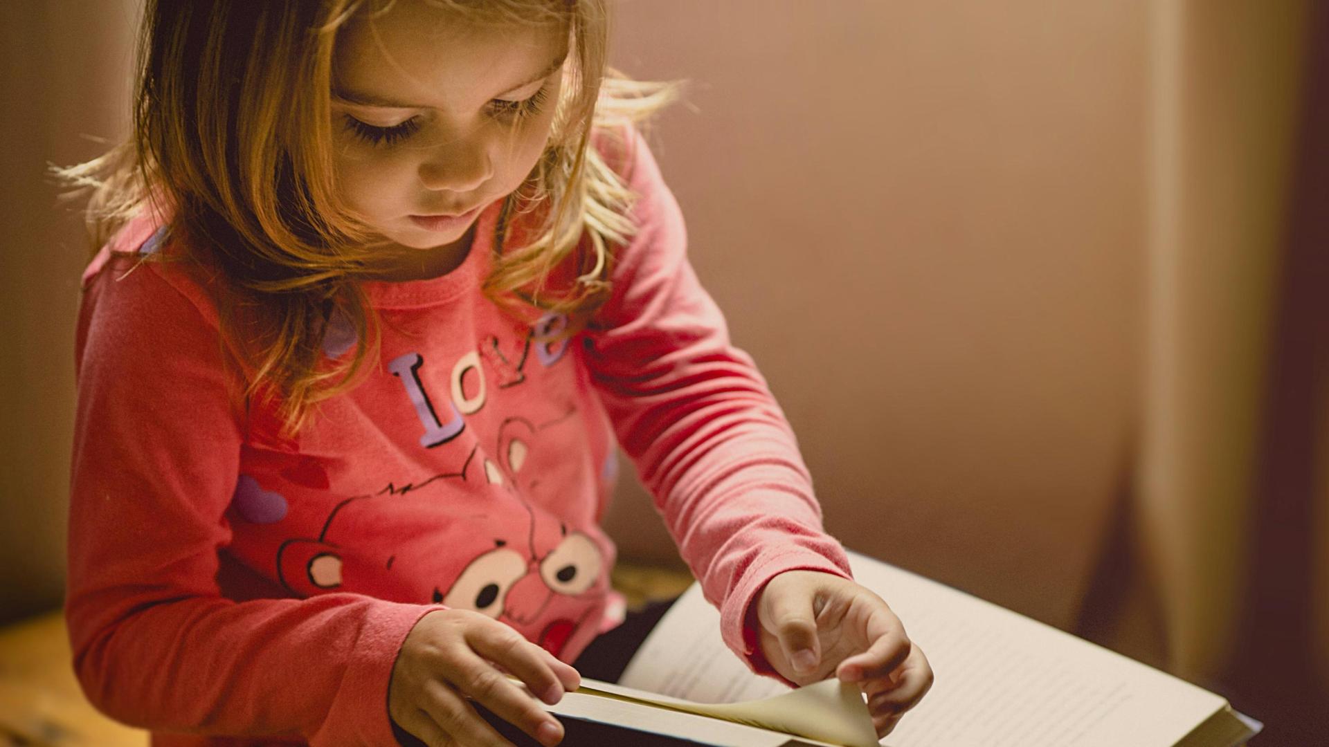 Child reading - Photo by Jonathan Borba on Unsplash   