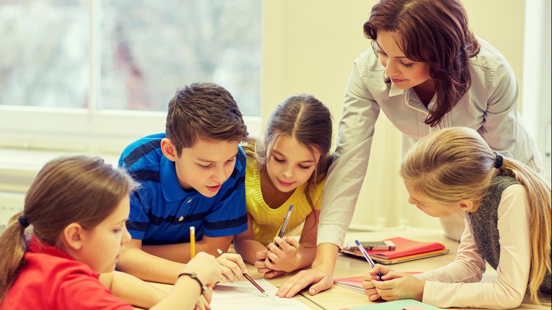 Teacher with students